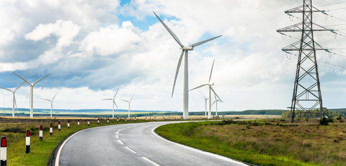 Country road through wind farm